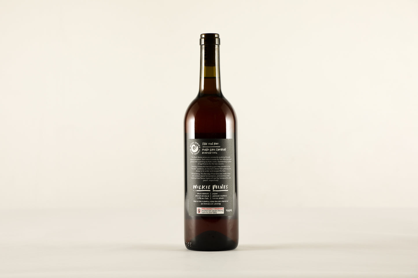 Wine bottle with a label on a white background