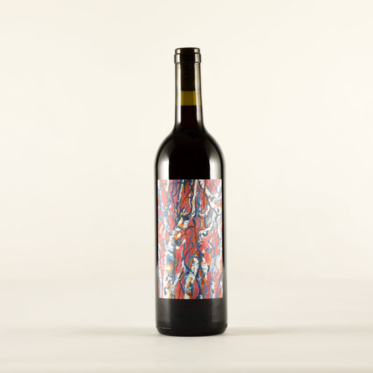 Wine bottle with a colorful label on a white background