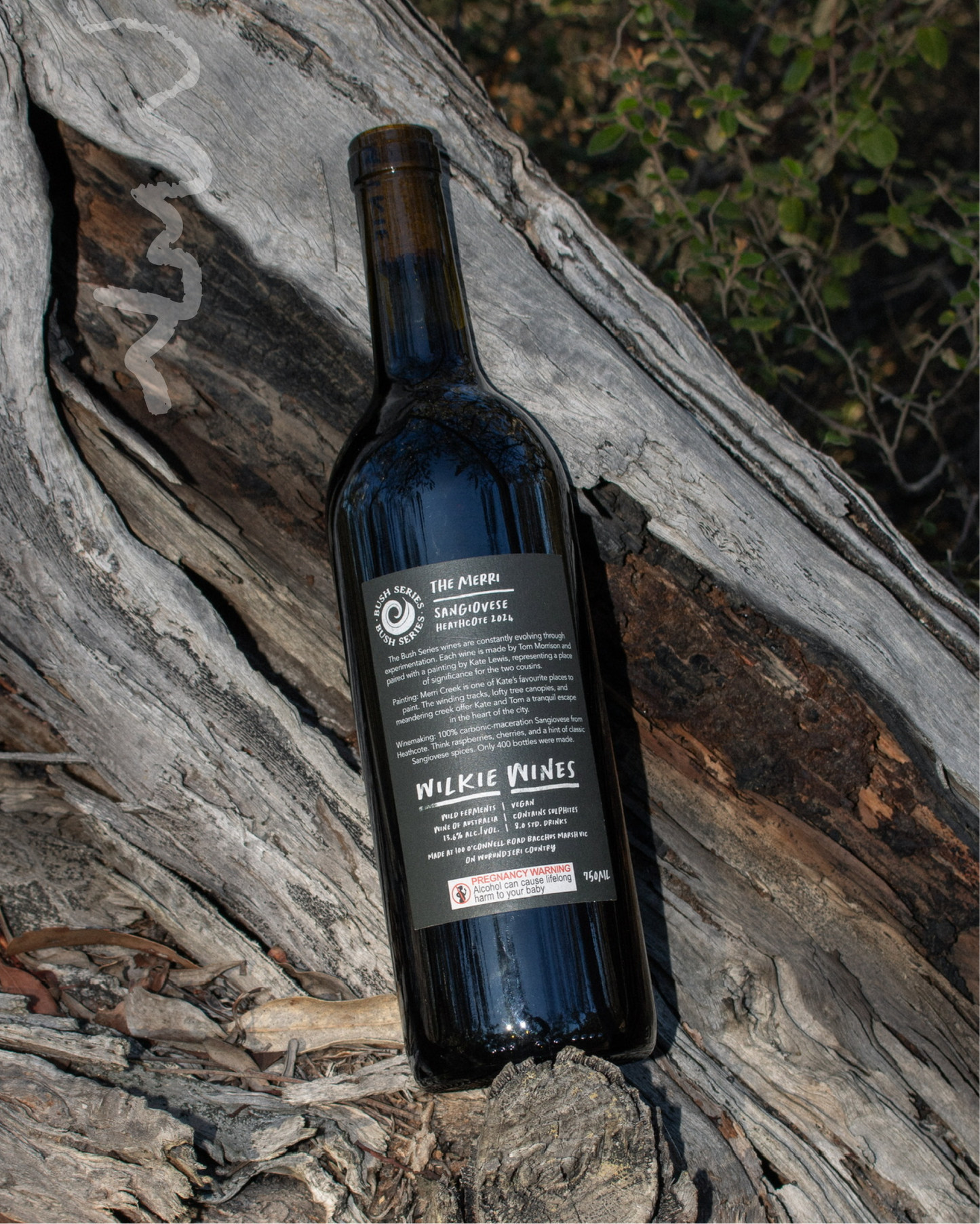 Wine bottle with label on a textured surface
