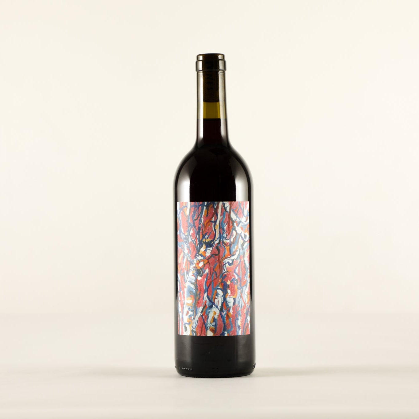 Wine bottle with a colorful label on a white background